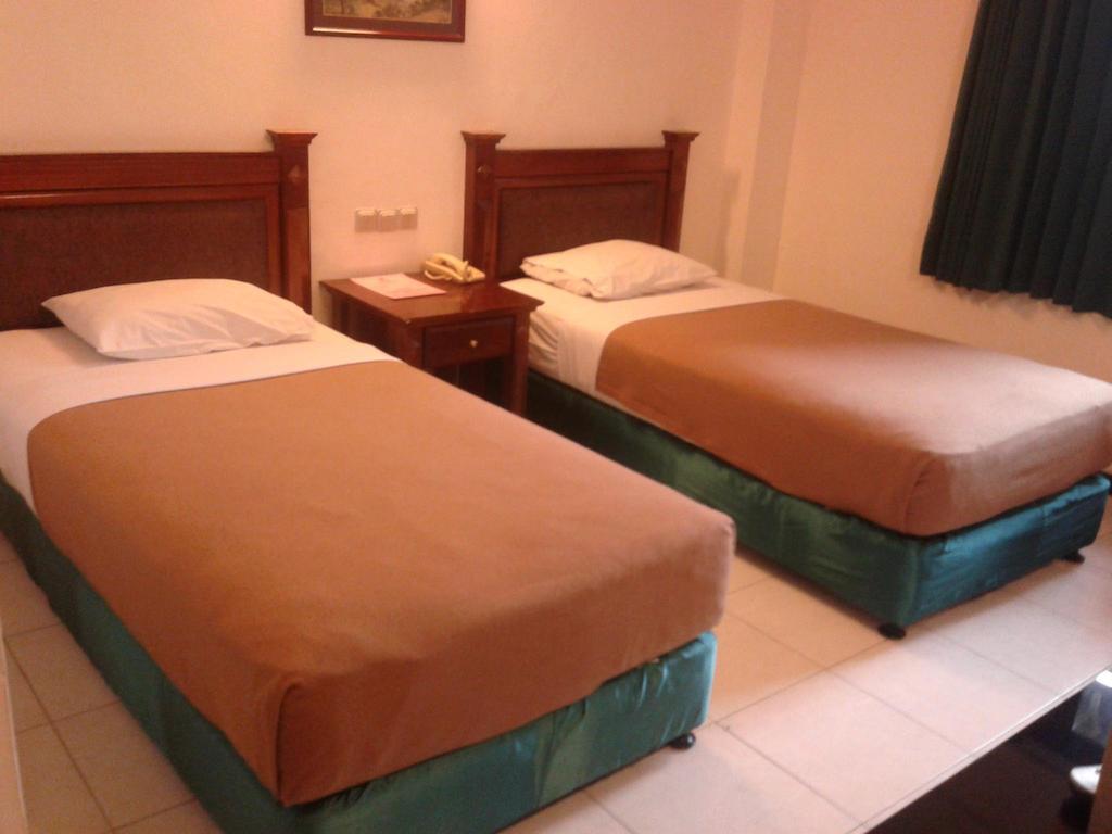 Hotel Fortuna Surabaya Oda fotoğraf